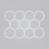 A grid of illuminated hexagonal shapes against a light gray background. Podgląd zdjęcia produktu