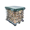 A metal cage filled with firewood, covered by a green tarp. Produktbild-Vorschau