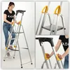 A collage of images showing a woman using a step ladder, close-ups of the ladder's handles and steps, and a close-up of the top platform. Podgląd zdjęcia produktu
