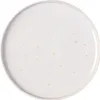 A white plate with gold speckles. Náhled obrázku produktu