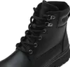 Close-up view of the upper part of a black boot. Produktbild-Vorschau