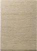 A close-up view of a beige shaggy rug. Náhled obrázku produktu