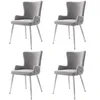 Four gray velvet dining chairs with silver metal legs are arranged in a grid on a white background. Podgląd zdjęcia produktu