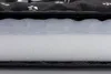 A close-up, cross-section view of a dog bed showing its layered construction. Náhľad obrázku produktu
