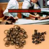 A collage showing a close-up of two people working with leather and a separate pile of brass rivets with pull ring buckles. Náhled obrázku produktu