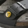 Close-up of a black Birkenstock sandal with an ESD symbol. Produktbild-Vorschau