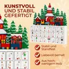 A Christmas advent calendar with a train and village scene, featuring numbered drawers. Produktbild-Vorschau