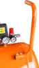 A close-up view of an orange air compressor's handle and gauges. Anteprima dell’immagine prodotto