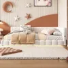 A modern bed with plush bedding and decorative elements on the wall. Náhľad obrázku produktu