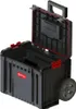 A black and gray Qbrick System Werkzeugtrolley with red accents and wheels, shown with its lid open. Náhled obrázku produktu