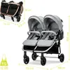 A folded and unfolded twin stroller with dimensions indicated. Produktbild-Vorschau