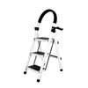 A white three-step folding ladder with black anti-slip treads and a black padded handle. Voir les images du produit