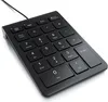 A black wired numeric keypad is shown from a diagonal angle against a white background. Voir les images du produit