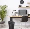 A home office setup with a desk, computer, chair, and a paper shredder. Produktbild-Vorschau