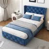 A bedroom scene with a blue upholstered bed as the main focus. Produktbild-Vorschau