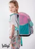 A young girl wearing a backpack. Anteprima dell’immagine prodotto