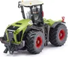 A model of a green tractor with red wheels and a white roof. Produktbild-Vorschau
