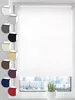 A white roller blind is shown in a window, with a cityscape visible outside. A small potted plant sits on the windowsill.