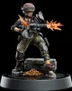 A detailed figurine of the Borderlands 3 character Moze, depicted in an action pose with a large weapon firing. Náhled obrázku produktu