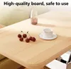 A close-up shot of a wooden table with cherries and a teacup on it, with text overlay. Produktbild-Vorschau