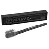 A black Marvis toothbrush with a clear protective cap and its black packaging box. Anteprima dell’immagine prodotto