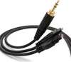 A black audio cable with gold-plated connectors against a white background. Produktbild-Vorschau