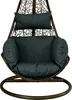 A hanging chair with cushions. Produktbild-Vorschau