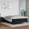 A black boxspring bed frame with a gray blanket is shown in a bedroom setting. Voir les images du produit