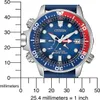 A close-up shot of a Citizen watch with a ruler for scale. Anteprima dell’immagine prodotto