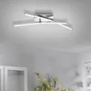 A modern LED ceiling light fixture with multiple arms, mounted on a white ceiling. Produktbild-Vorschau