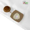 A close-up of a vacuum cleaner bag with a cap and a sealing mechanism. Produktbild-Vorschau
