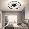 A modern bedroom with a bed, window, and a ceiling light. Produktbild-Vorschau