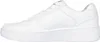 A side view of a white sneaker. Voir les images du produit