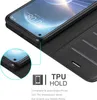 A close-up view of a black phone case with a phone inside, showcasing its features and materials. Náhled obrázku produktu