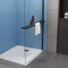 A modern shower enclosure with blue tiled walls and a white shower tray. Produktbild-Vorschau