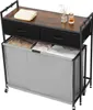 A laundry cart with a wooden top, two drawers, and three compartments for sorting laundry. Náhled obrázku produktu