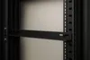 A close-up view of a black metal rack shelf mounted inside a server rack. Produktbild-Vorschau