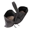 A black fabric bag filled with sand, designed to weigh down a pavilion or tent. Produktbild-Vorschau