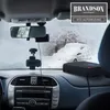 View from inside a car looking out at a snowy scene, with a car heater on the dashboard. Produktbild-Vorschau