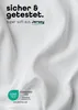 A close-up of white, wrinkled fabric with text and logos. Produktbild-Vorschau