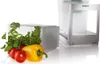 A close-up shot of a kitchen waste sorting system with fresh vegetables. Produktbild-Vorschau