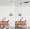 A split image showing a dining table with a pendant lamp before and after a lighting system upgrade. Produktbild-Vorschau