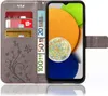 A grey flip case for a Samsung Galaxy A03 phone, with cards and euro banknotes inserted into the case. Produktbild-Vorschau