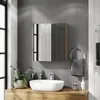 A modern bathroom vanity with a sink and a mirrored cabinet. Produktbild-Vorschau