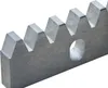 A close-up, professional shot of a metal rack with teeth and a hole, isolated on a white background. Náhľad obrázku produktu