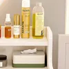 Various cosmetic and personal care products displayed on a shelf. Produktbild-Vorschau