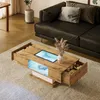 A modern living room scene with a coffee table in the foreground and a sofa in the background. Produktbild-Vorschau