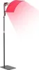 A red light therapy panel with a stand, emitting red light. Produktbild-Vorschau