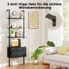 A black ladder shelf with drawers is shown in a living room setting, next to a sofa and plants. A close-up of a wall anchor is also visible. Podgląd zdjęcia produktu