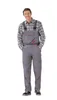 A man wearing overalls and a plaid shirt stands against a white background. Produktbild-Vorschau